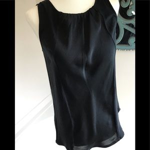 sleeveless blouse with silky detail on front.